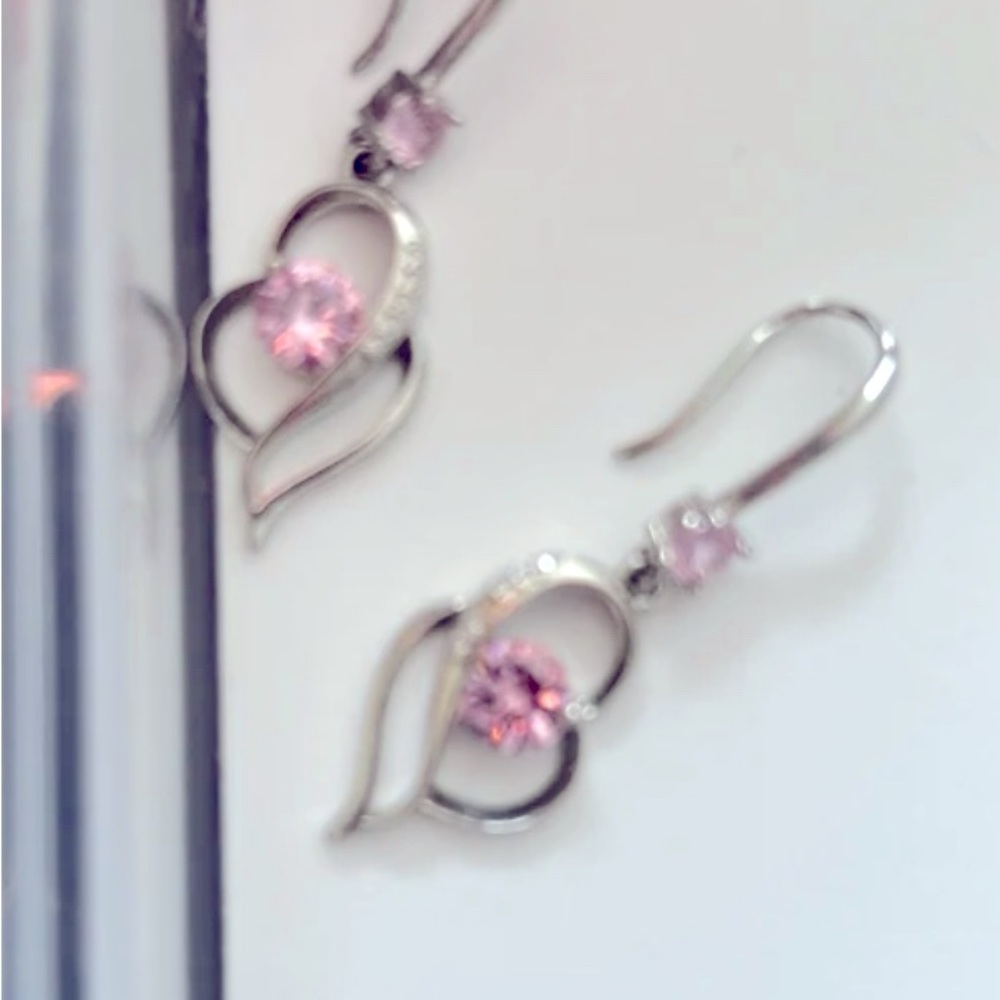 Heart shaped dangle earrings with pink stones